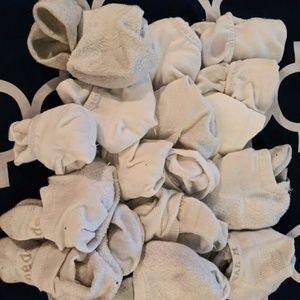 Lot of womens white ankle socks.